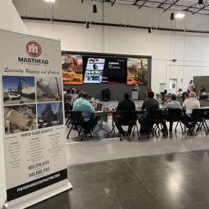 Street market stall with clothing and handmade goods